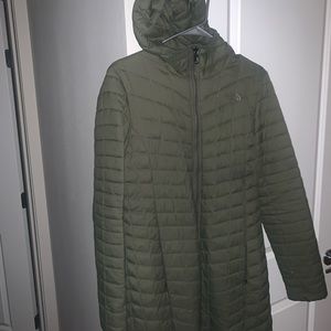 Women’s North Face olive green jacket. Zip up. Has some flaws as seen in pics.